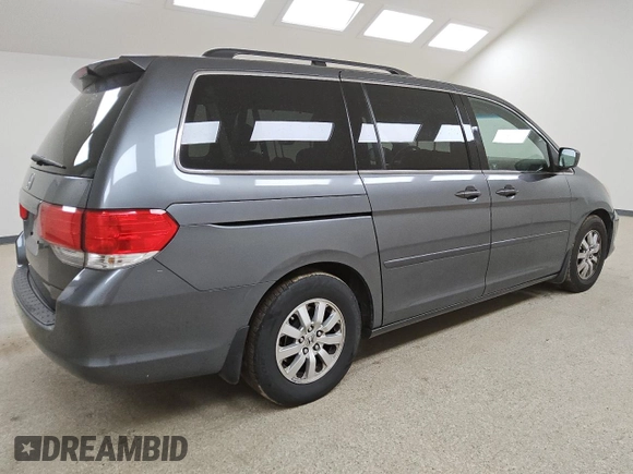 2010 Honda Odyssey EX-L с VIN 5FNRL3H63AB114151, выставлен на аукционе Copart как лот 57988615 с пробегом 147 804 миль миль и Чистый • Clean title. История ставок и продаж доступна на DreamBid. Изображение 3.