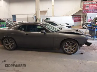 2015 Dodge Challenger R/T with VIN 2C3CDZAT5FH794310, listed as a IAAI auction lot 41725179 with 84,961 mi miles and . Bid and sale history available at DreamBid. Image 14.