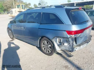 2014 Honda Odyssey Touring with VIN 5FNRL5H98EB102430, listed as a IAAI auction lot 41683822 with 185,802 mi miles. Bid and sale history available at carsss.com. Image 3.