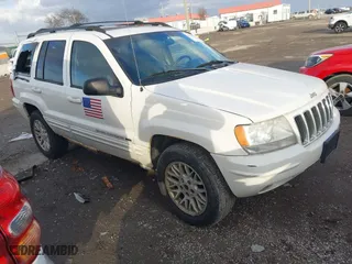 2003 Jeep Grand Cherokee Limited with VIN 1J4GW58N73C569872, listed as a IAAI auction lot 41461416 with 149,185 mi miles. Bid and sale history available at carsss.com. Image 1.