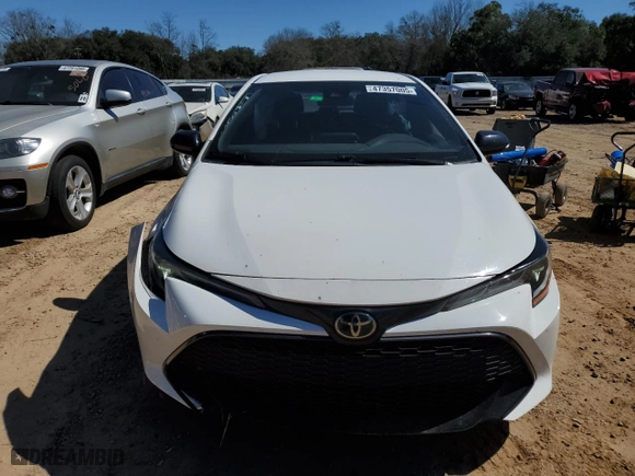 2021 Toyota Corolla Hatchback SE with VIN JTND4MBE4M3132376, listed as a Copart auction lot 47357005 with 104,713 mi miles and Salvage Title. Bid and sale history available at carsss.com. Image 5.