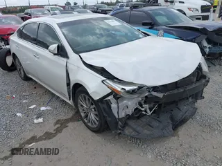 2016 Toyota Avalon XLE Premium z VIN 4T1BD1EB0GU056337, wystawiony jako IAAI lot #42110091 z przebiegiem 296 715 mil mil oraz . Historia ofert i sprzedaży dostępna na DreamBid. Obrazek 1.