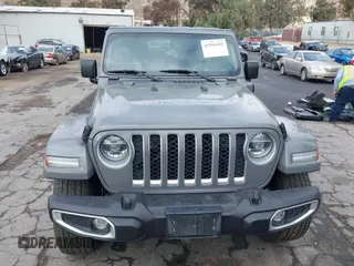 2021 Jeep Wrangler Unlimited Sahara with VIN 1C4JJXP64MW720263, listed as a IAAI auction lot 41514302 with 73,300 mi miles and . Bid and sale history available at DreamBid. Image 13.