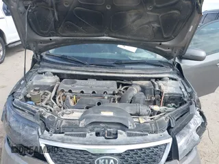 2012 Kia Forte EX with VIN KNAFU4A25C5492664, listed as a IAAI auction lot 41889921 with 163,334 mi miles and . Bid and sale history available at DreamBid. Image 10.