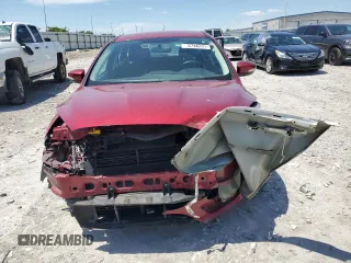 2016 Ford Focus Titanium with VIN 1FADP3N26GL202929, listed as a Copart auction lot 57466095 with 101,525 mi miles and Salvage title. Bid and sale history available at DreamBid. Image 5.