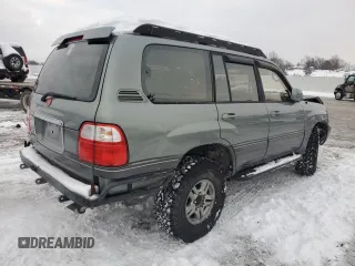 2002 Lexus LX 470 z VIN JTJHT00W923514121, wystawiony jako Copart lot #87761105 z przebiegiem 247 752 mil mil oraz Szkody całkowita. Historia ofert i sprzedaży dostępna na DreamBid. Obrazek 3.