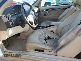 1997 Mercedes-Benz SL 500 with VIN WDBFA67FXVF149930, listed as a Copart auction lot 64749525 with 88,523 mi miles and Salvage title. Bid and sale history available at DreamBid. Image 7.