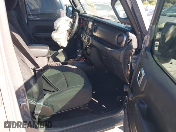 2021 Jeep Gladiator Willys with VIN 1C6HJTAG4ML517715, listed as a IAAI auction lot 41436634 with 21,187 mi miles and . Bid and sale history available at DreamBid. Image 5.