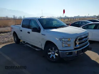 2015 Ford F-150 XLT w/HD Payload Pkg with VIN 1FTFW1EG7FFB09470, listed as a IAAI auction lot 41455246 with 152,766 mi miles. Bid and sale history available at carsss.com. Image 1.