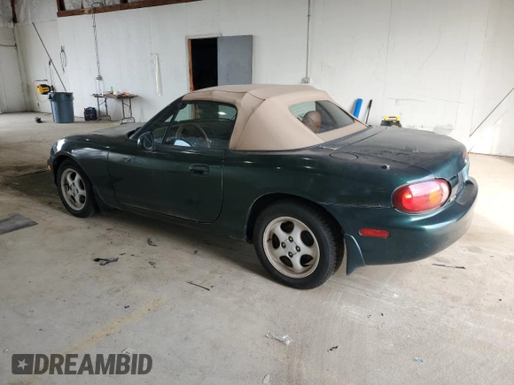 1999 Mazda MX-5 Miata z VIN JM1NB353XX0111850, wystawiony jako Copart lot #53076805 z przebiegiem 128 707 mil mil oraz Szkoda całkowita • Salvage title. Historia ofert i sprzedaży dostępna na DreamBid. Obrazek 2.