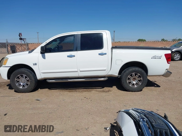 2004 Nissan Titan LE z VIN 1N6AA07B14N528418, wystawiony jako IAAI lot #42281318 z przebiegiem 200 902 mil mil oraz . Historia ofert i sprzedaży dostępna na DreamBid. Obrazek 14.