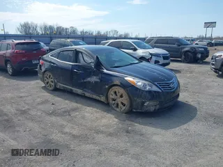 2013 Hyundai Azera with VIN KMHFH4JG6DA233205, listed as a IAAI auction lot 41643389 with 200,842 mi miles and . Bid and sale history available at carsss.com. Image 1.