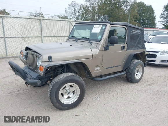 2003 Jeep Wrangler SE with VIN 1J4FA29113P304250, listed as a IAAI auction lot 40917099 with 191,589 mi miles. Bid and sale history available at carsss.com. Image 2.