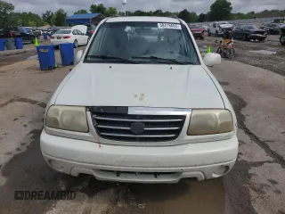 2002 Suzuki XL7 Standard z VIN JS3TY92V024106089, wystawiony jako Copart lot #58418685 z przebiegiem 232 254 mil mil oraz Szkoda całkowita • Salvage title. Historia ofert i sprzedaży dostępna na DreamBid. Obrazek 5.