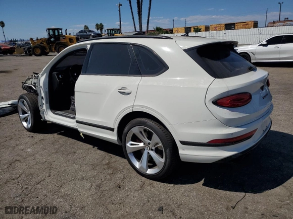 2021 Bentley Bentayga V8 with VIN SJAAM2ZVXMC032804, listed as a Copart auction lot 70631504 with 37960 miles and Salvage Title. Bid and sale history available at carsss.com. Image 2.