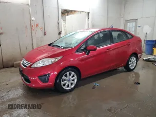 2012 Ford Fiesta SE with VIN 3FADP4BJ1CM147493, listed as a Copart auction lot 51436635 with 166,121 mi miles and Salvage Title. Bid and sale history available at DreamBid. Image 1.