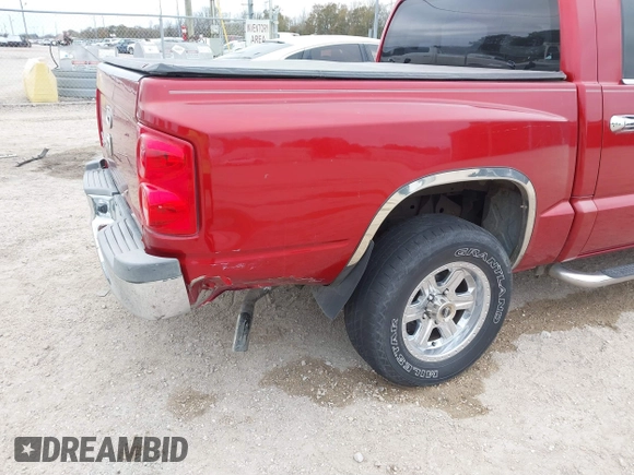 2006 Dodge Dakota SLT with VIN 1D7HE48K26S511004, listed as a IAAI auction lot 41344188 with 208,273 mi miles and . Bid and sale history available at DreamBid. Image 6.