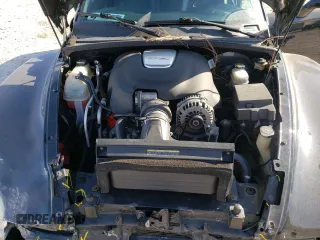 2005 Chevrolet SSR LS z VIN 1GCES14H35B121137, wystawiony jako Copart lot #77892444 z przebiegiem 89 997 mil mil oraz Szkoda całkowita • Salvage title. Historia ofert i sprzedaży dostępna na DreamBid. Obrazek 11.