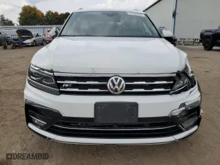 2020 Volkswagen Tiguan SEL Premium R-Line with VIN 3VV4B7AX8LM033024, listed as a Copart auction lot 77354494 with 127,247 mi miles and Salvage Title. Bid and sale history available at carsss.com. Image 5.