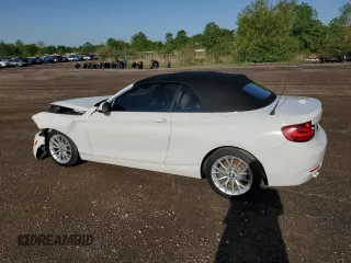 2015 BMW 2 Series 228i with VIN WBA1K5C51FV474079, listed as a Copart auction lot 57457875 with 62,946 mi miles and Salvage title. Bid and sale history available at DreamBid. Image 2.