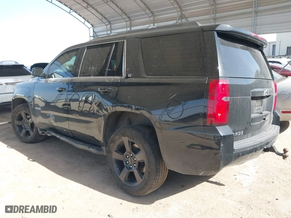 2019 Chevrolet Tahoe LT with VIN 1GNSCBKC0KR328639, listed as a IAAI auction lot 41740284 with 111,734 mi miles. Bid and sale history available at carsss.com. Image 3.
