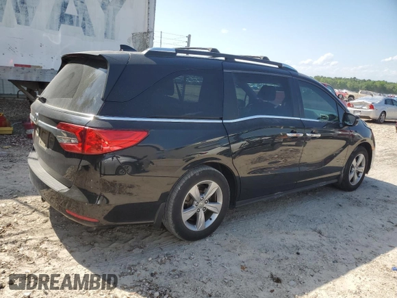 2019 Honda Odyssey EX-L with VIN 5FNRL6H73KB103467, listed as a Copart auction lot 52604005 with 101,892 mi miles and Salvage Title. Bid and sale history available at DreamBid. Image 3.