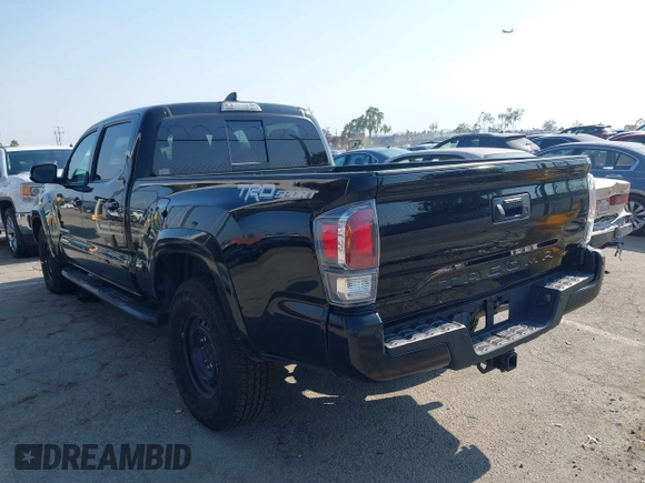 2022 Toyota Tacoma SR5 with VIN 3TMBZ5DN6NM034630, listed as a IAAI auction lot 42733932 with 43,309 mi miles and . Bid and sale history available at DreamBid. Image 3.