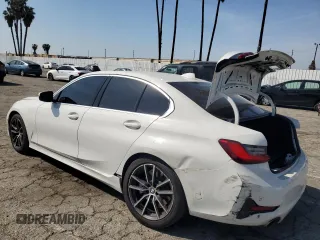 2021 BMW 3 Series 330i with VIN 3MW5R1J0XM8C09626, listed as a Copart auction lot 52205805 with 52,261 mi miles and Salvage title. Bid and sale history available at DreamBid. Image 2.