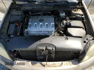 2003 Cadillac DeVille z VIN 1G6KD54Y63U250482, wystawiony jako Copart lot #52164515 z przebiegiem 131 376 mil mil oraz Szkoda całkowita • Salvage title. Historia ofert i sprzedaży dostępna na DreamBid. Obrazek 11.