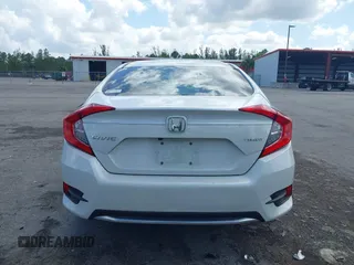 2020 Honda Civic LX z VIN 2HGFC2F65LH531818, wystawiony jako IAAI lot #41997104 z przebiegiem 68 878 mil mil oraz . Historia ofert i sprzedaży dostępna na DreamBid. Obrazek 17.