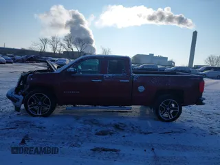 2014 Chevrolet Silverado 1500 LT with VIN 1GCVKREC1EZ214506, listed as a IAAI auction lot 41316320 with 128,519 mi miles and . Bid and sale history available at DreamBid. Image 14.