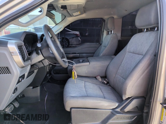 2021 Ford F-150 XL with VIN 1FTMF1C50MKD81601, listed as a Copart auction lot 49331765 with 65,702 mi miles and Salvage title. Bid and sale history available at DreamBid. Image 7.