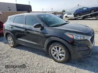2020 Hyundai Tucson SE z VIN KM8J23A43LU250469, wystawiony jako Copart lot #56179735 z przebiegiem 113 473 mil mil oraz Czysty tytuł • Clean title. Historia ofert i sprzedaży dostępna na DreamBid. Obrazek 4.