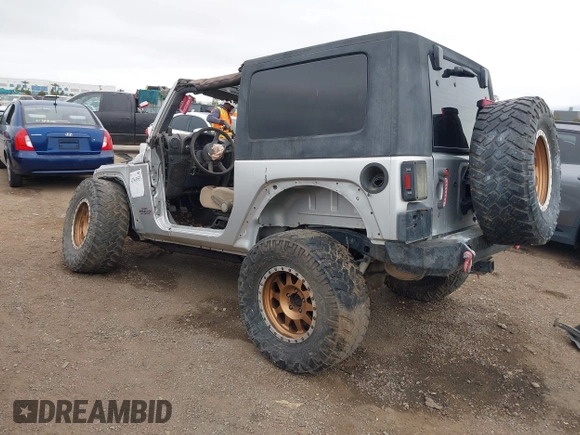 2009 Jeep Wrangler X with VIN 1J4FA24149L775557, listed as a IAAI auction lot 42363653 with Not provided miles and . Bid and sale history available at DreamBid. Image 3.