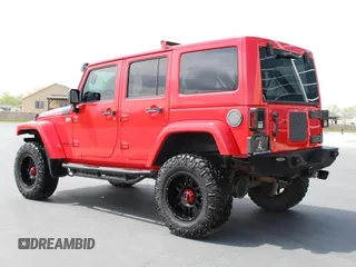 2015 Jeep Wrangler Unlimited Rubicon with VIN 1C4BJWFG7FL646463, listed as a Copart auction lot 53700245 with 97,412 mi miles and Salvage Title. Bid and sale history available at carsss.com. Image 4.
