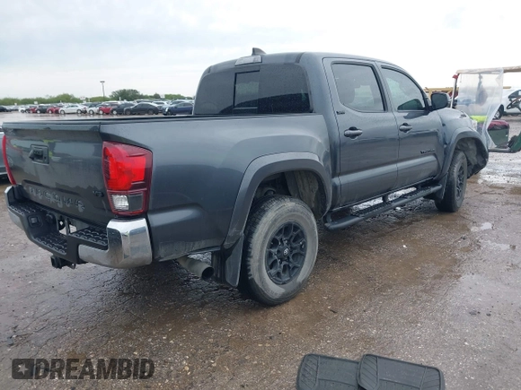 2022 Toyota Tacoma SR5 with VIN 3TMAZ5CN9NM195132, listed as a IAAI auction lot 42383482 with 51,011 mi miles and . Bid and sale history available at DreamBid. Image 4.