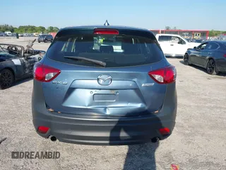 2016 Mazda CX-5 Sport with VIN JM3KE2BY8G0864983, listed as a IAAI auction lot 42072385 with 141,104 mi miles. Bid and sale history available at carsss.com. Image 16.