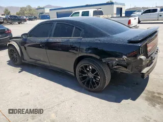 2013 Dodge Charger Police z VIN 2C3CDXAT2DH722403, wystawiony jako Copart lot #59879245 z przebiegiem 195 730 mil mil oraz Szkoda całkowita • Salvage title. Historia ofert i sprzedaży dostępna na DreamBid. Obrazek 2.