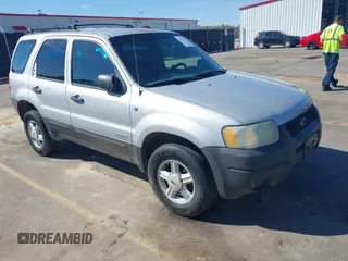 2002 Ford Escape XLS Choice with VIN 1FMYU01122KD14038, listed as a IAAI auction lot 41765177 with 233,693 mi miles and . Bid and sale history available at DreamBid. Image 1.