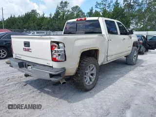 2014 GMC Sierra 1500 SLT with VIN 3GTU2VEC4EG495012, listed as a IAAI auction lot 42126799 with 271,770 mi miles and . Bid and sale history available at DreamBid. Image 4.