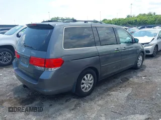 2010 Honda Odyssey EX with VIN 5FNRL3H42AB110879, listed as a IAAI auction lot 42257313 with 197,190 mi miles and . Bid and sale history available at DreamBid. Image 4.