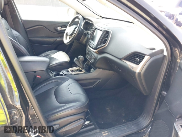 2014 Jeep Cherokee Limited with VIN 1C4PJMDS5EW242544, listed as a IAAI auction lot 42213907 with 114,515 mi miles and . Bid and sale history available at DreamBid. Image 5.