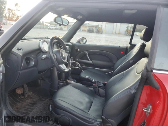 2006 MINI Convertible with VIN WMWRF335X6TG14530, listed as a Copart auction lot 87468504 with 93,875 mi miles and Clean title. Bid and sale history available at DreamBid. Image 7.
