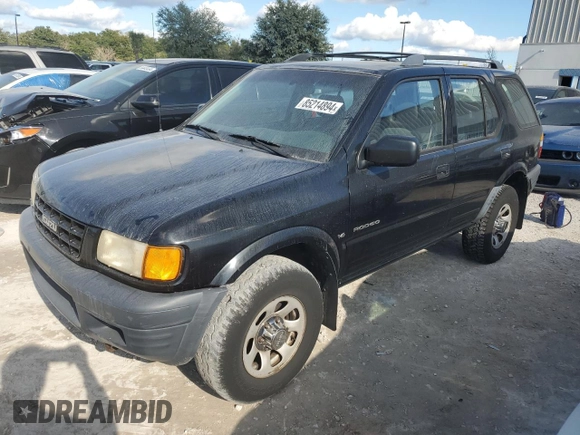 1999 Isuzu Rodeo S with VIN 4S2CK58W7X4357230, listed as a Copart auction lot 85214894 with 130,370 mi miles and Salvage title. Bid and sale history available at DreamBid. Image 1.