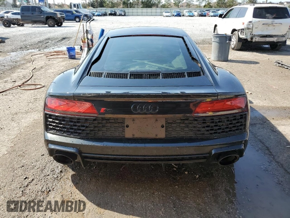 2021 Audi R8 V10 z VIN WUABAAFX7M7900586, wystawiony jako Copart lot #43702475 z przebiegiem 20 246 mil mil oraz Szkoda całkowita • Salvage title. Historia ofert i sprzedaży dostępna na DreamBid. Obrazek 6.