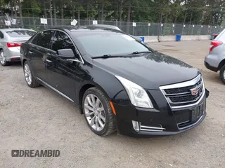 2016 Cadillac XTS Luxury Collection with VIN 2G61N5S38G9141105, listed as a IAAI auction lot 42430714 with 105,122 mi miles and . Bid and sale history available at DreamBid. Image 1.