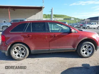 2014 Ford Edge SEL z VIN 2FMDK4JC7EBB61362, wystawiony jako IAAI lot #42159876 z przebiegiem 260 060 mil mil oraz . Historia ofert i sprzedaży dostępna na DreamBid. Obrazek 14.