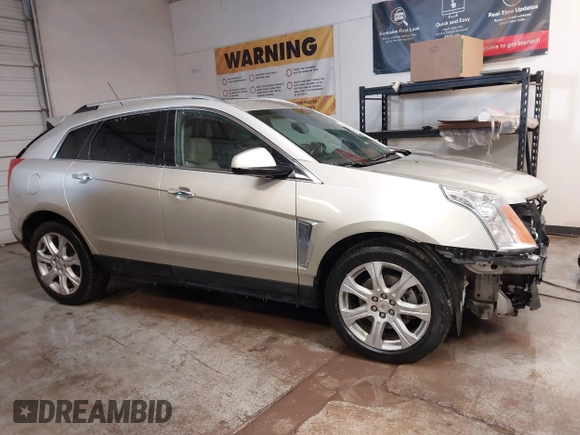 2015 Cadillac SRX Premium Collection with VIN 3GYFNDE32FS623153, listed as a IAAI auction lot 41577809 with 149,932 mi miles. Bid and sale history available at carsss.com. Image 14.