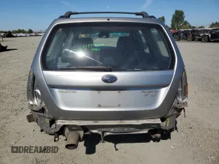 2007 Subaru Forester Sports XT with VIN JF1SG69677H709010, listed as a Copart auction lot 72143004 with 153,460 mi miles and Salvage Title. Bid and sale history available at carsss.com. Image 6.