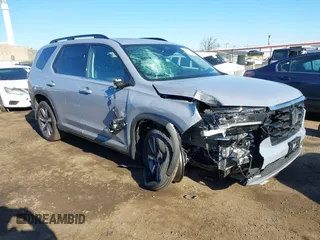 2025 Honda Pilot Elite z VIN 5FNYG1H84SB082060, wystawiony jako IAAI lot #41665288 z przebiegiem 2 148 mil mil oraz . Historia ofert i sprzedaży dostępna na DreamBid. Obrazek 1.